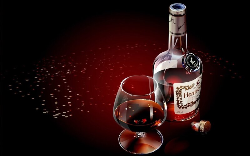 Hennessy cognac bottle and glass