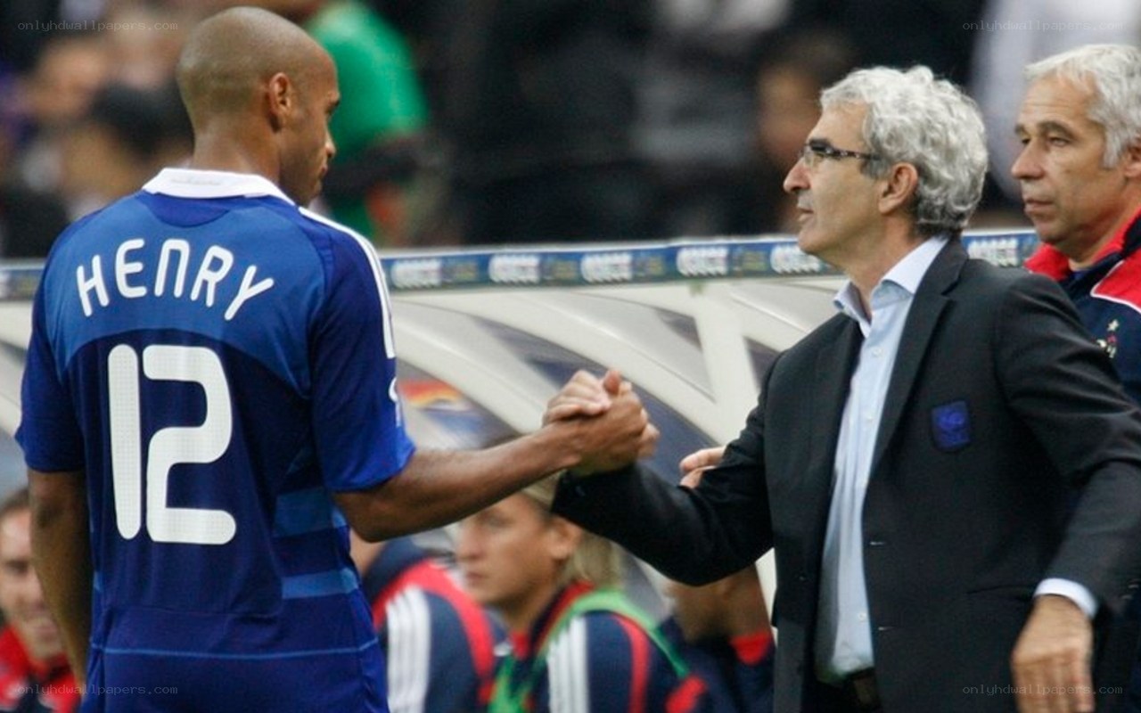 Henry and coach shake hands
