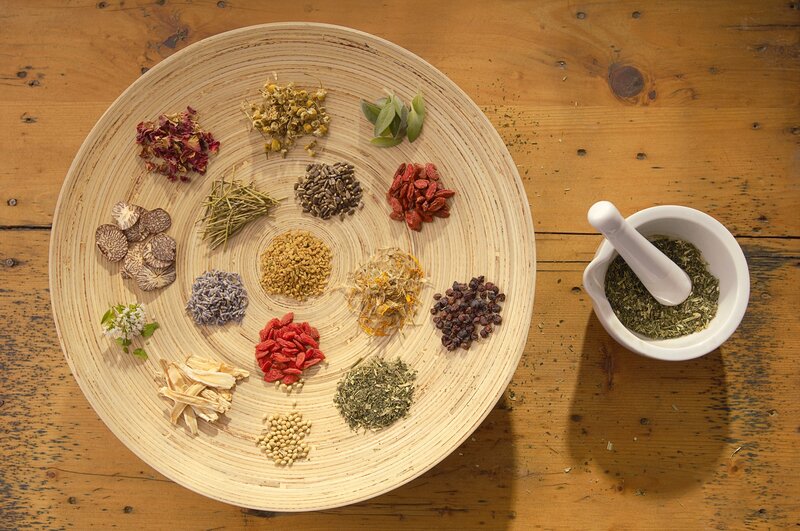 Herbs and spices on wooden tray