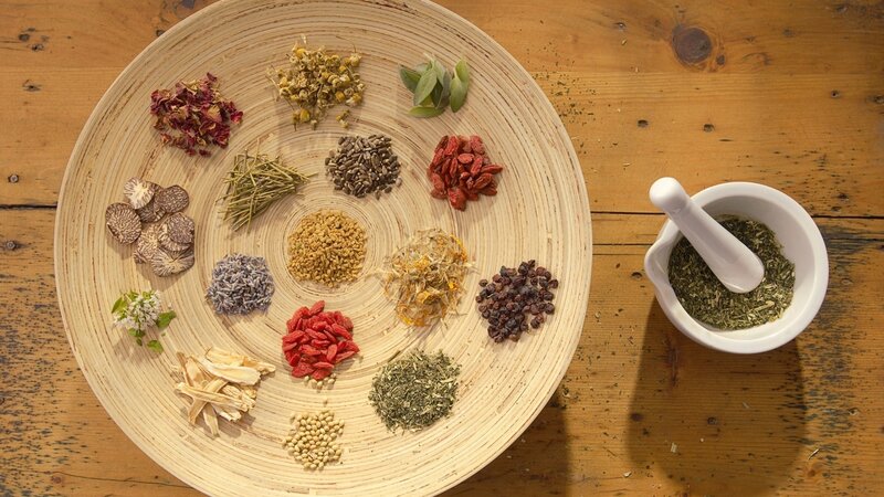 herbs and spices on wooden tray