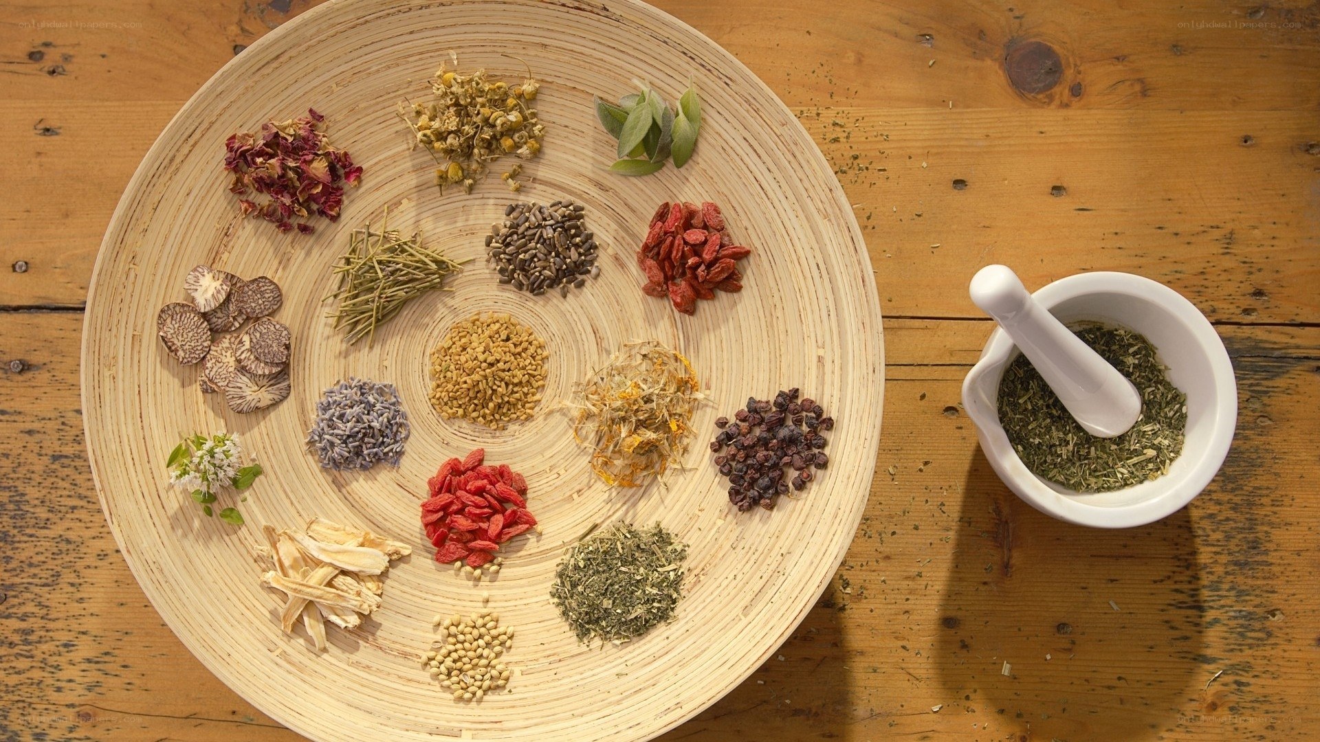 herbs and spices on wooden tray