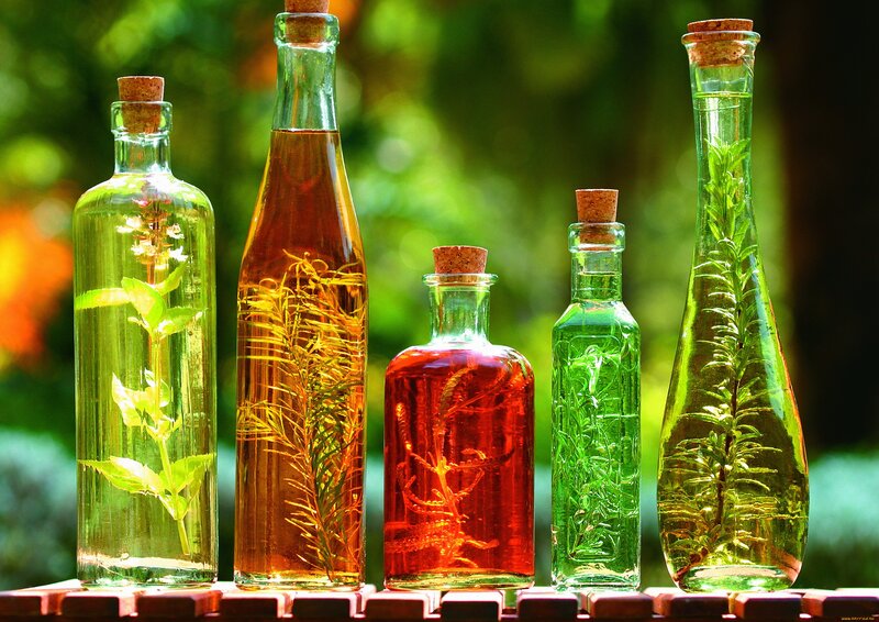 Herbs in Glass Bottles