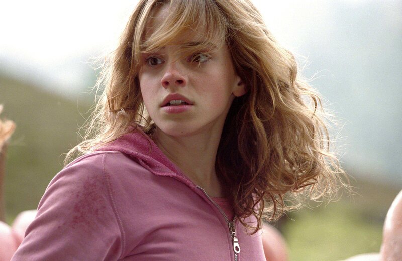 Hermione in a pink hoodie