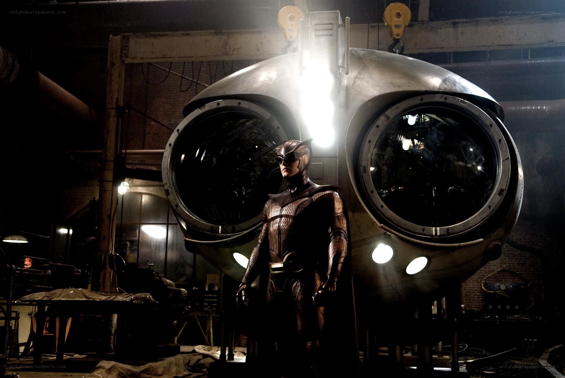 hero stands before futuristic craft