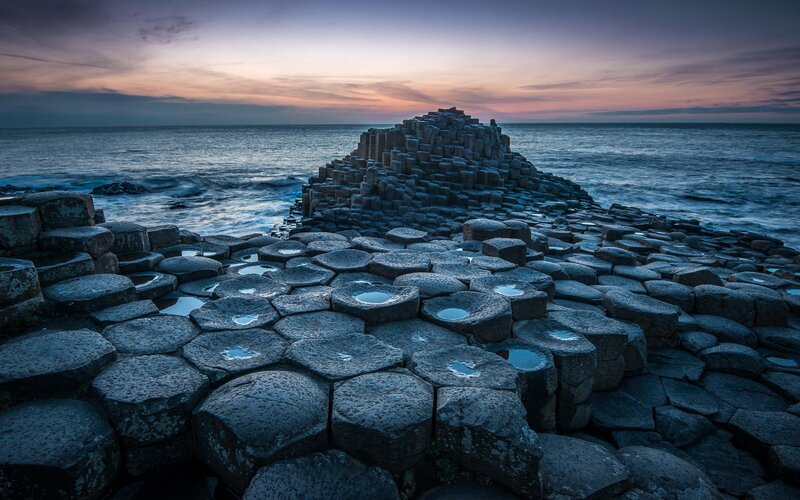 Hexagonal Basalt Columns — Blue, Dramatic, Sunset