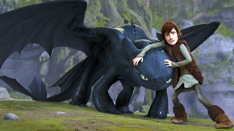 Hiccup hugging his dragon