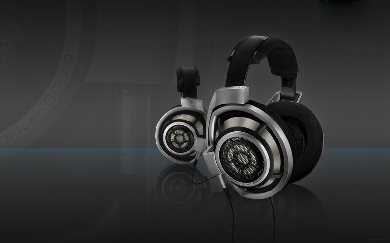 High-end headphones on reflective surface