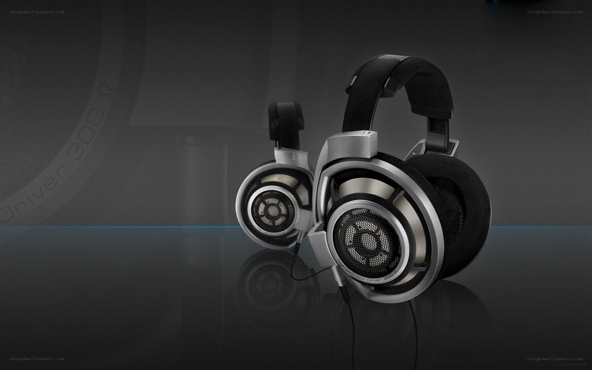 High-end headphones on reflective surface