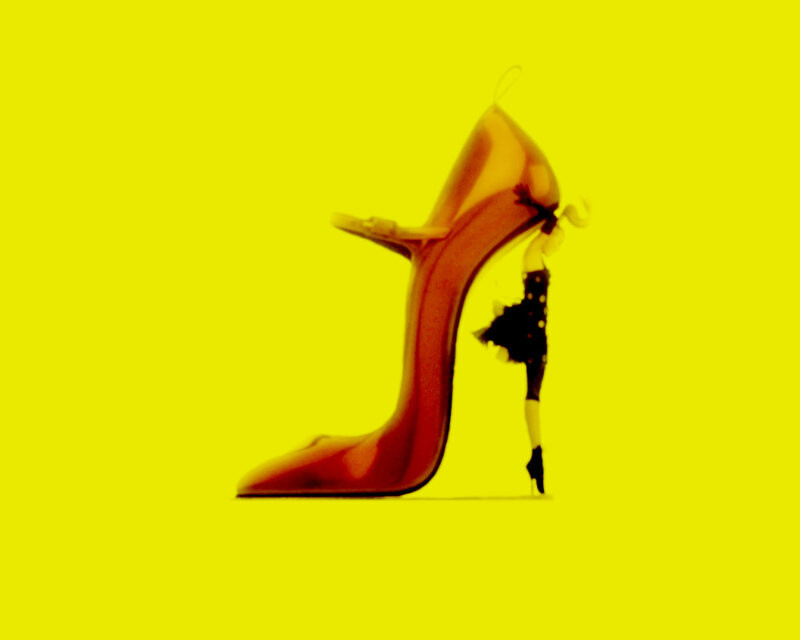 high-heeled shoe with dancer