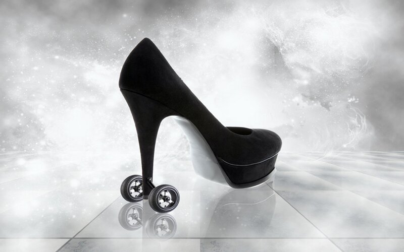 high-heeled shoe with wheels