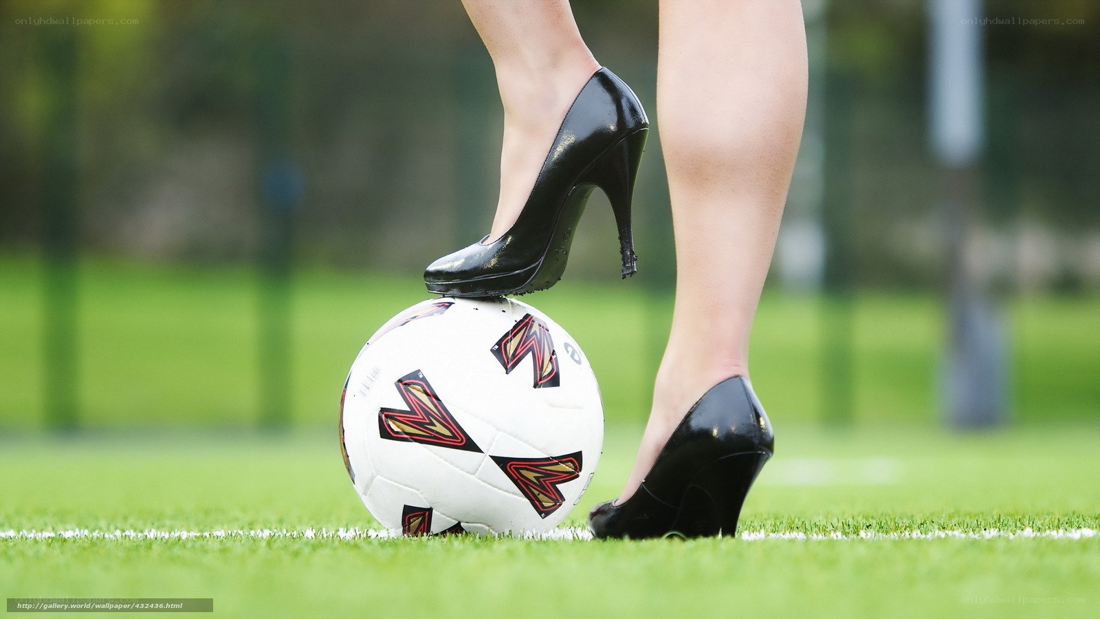 high heels on soccer ball