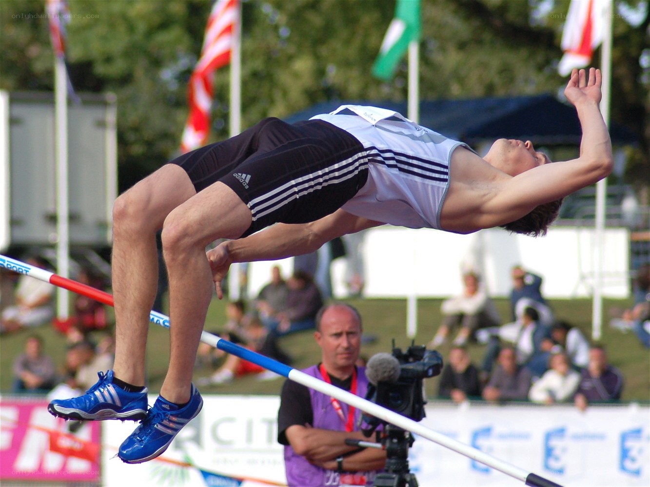High jumper clearing the bar