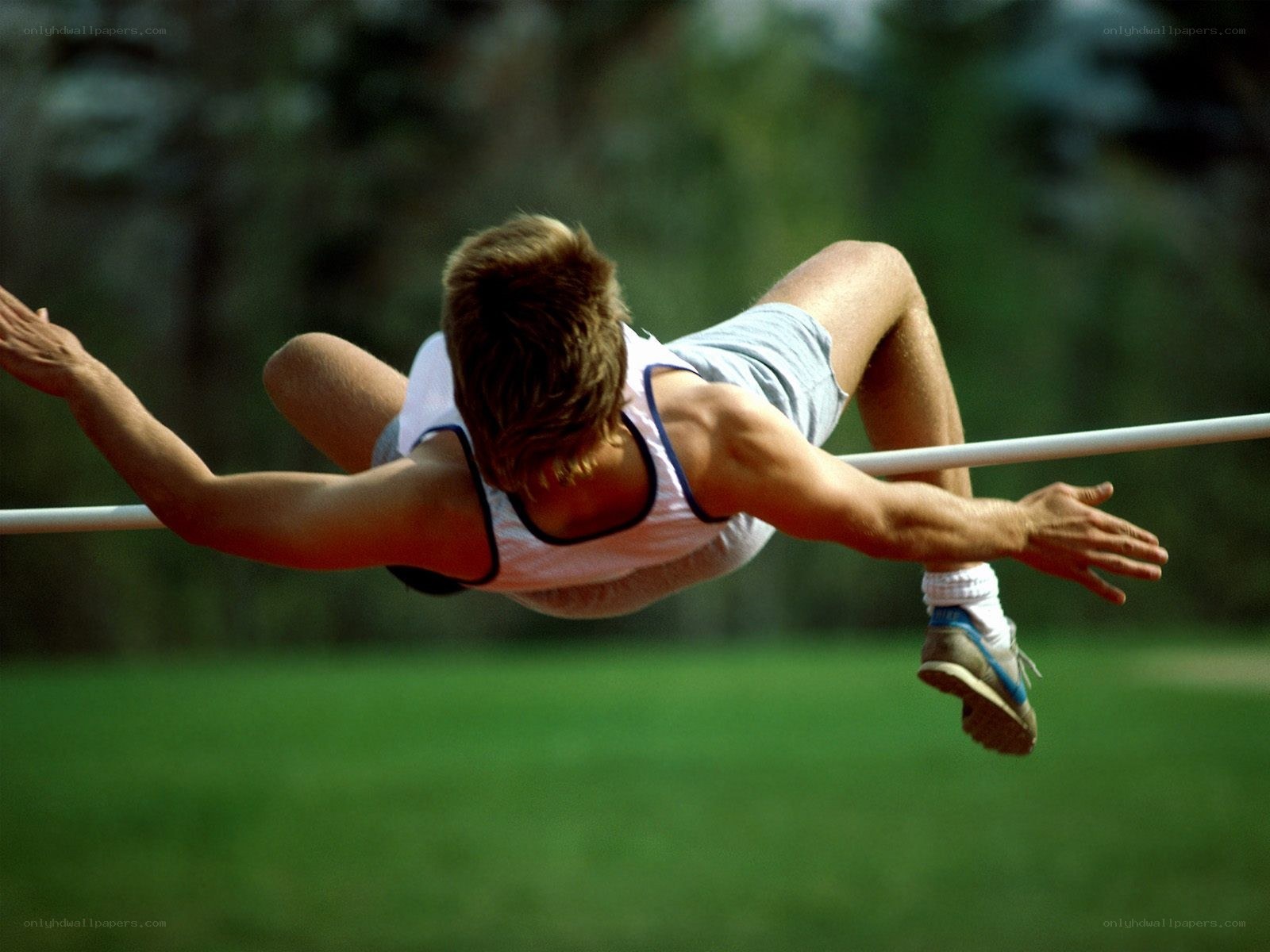 High jumper clearing the bar