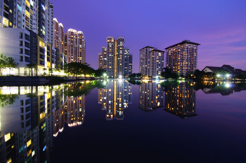 High-rise Buildings at Night — Purple