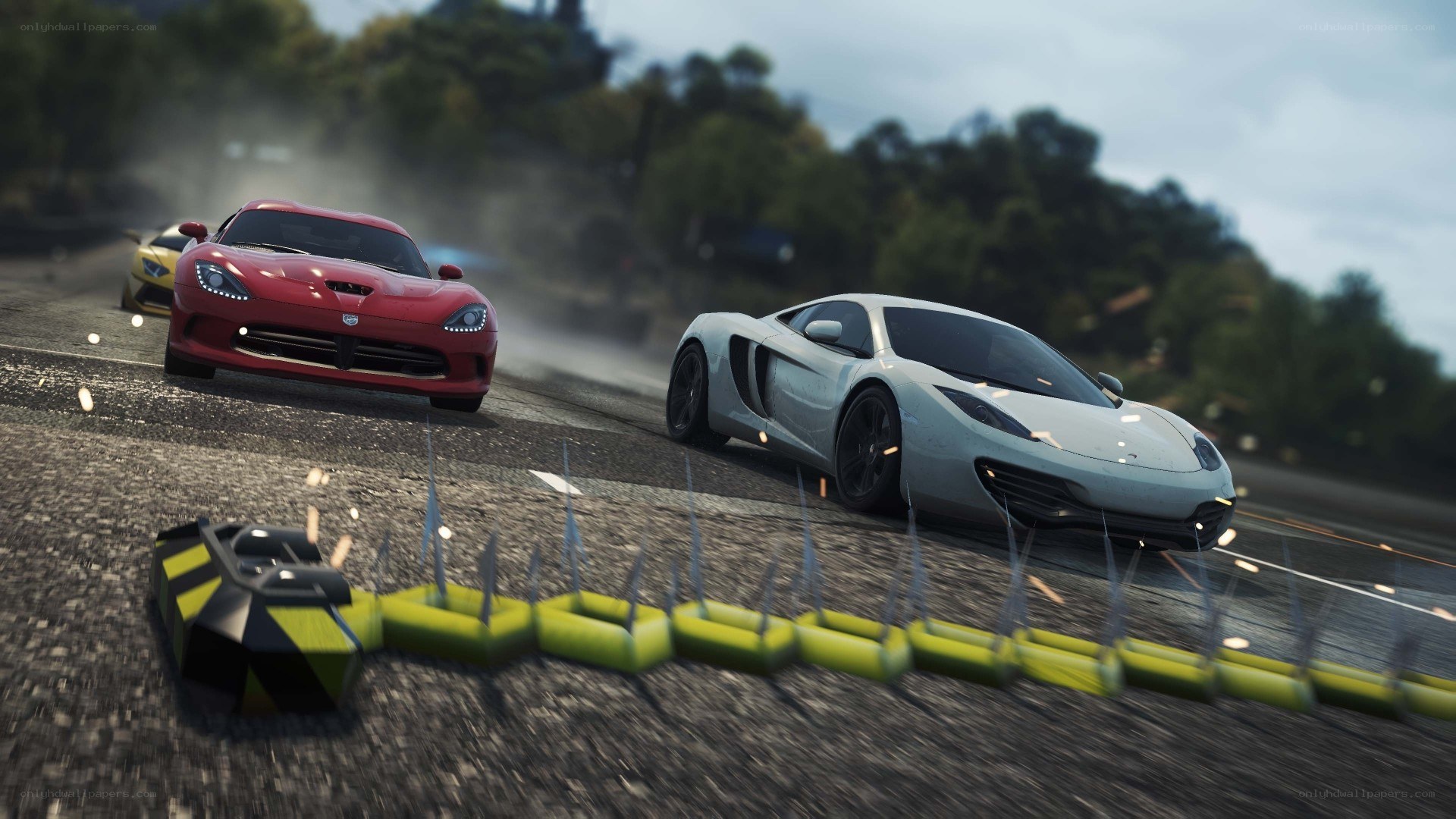 High-speed car chase on a racetrack