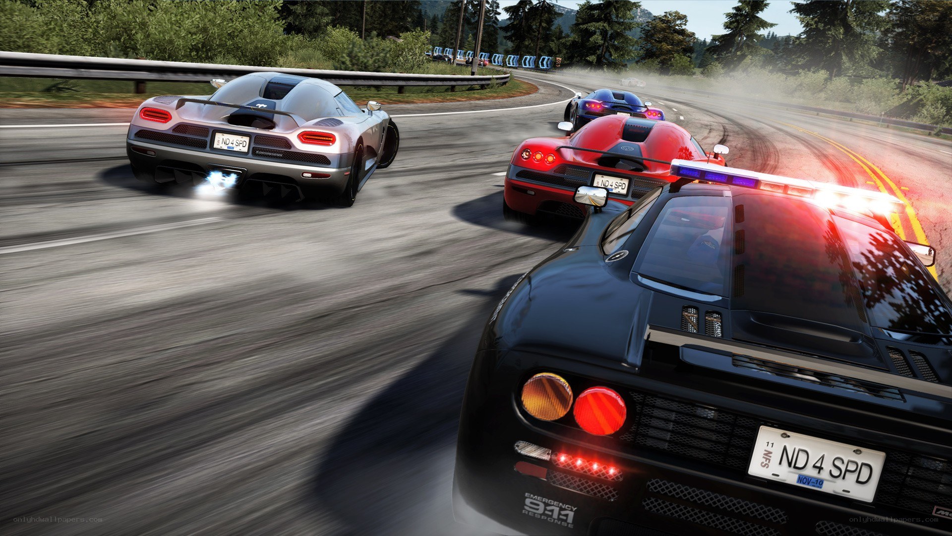 high-speed car chase on winding road