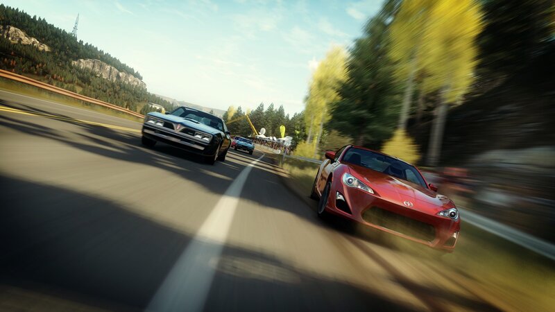 High-speed car race on winding road