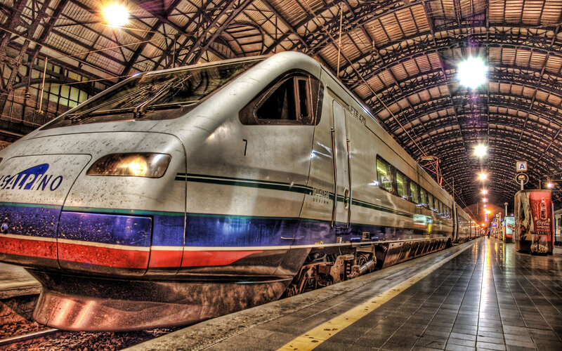 High-speed Train at Station — Silver, Dramatic