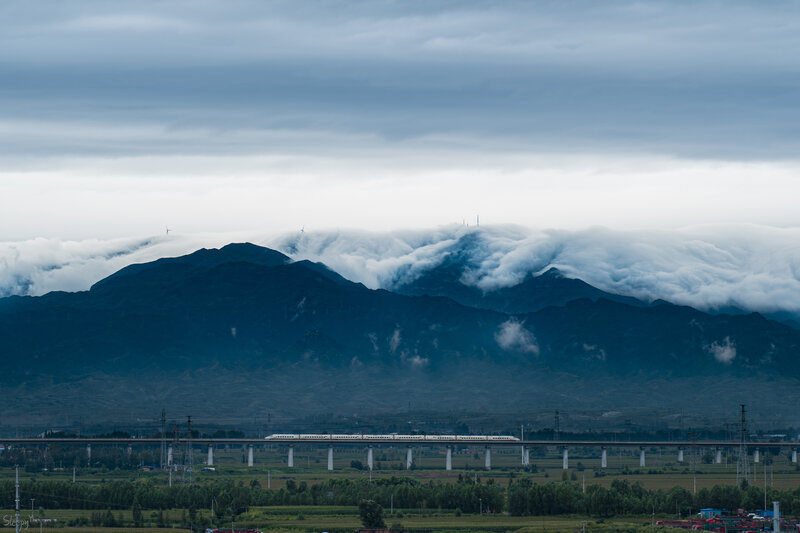 High-speed Train on Bridge — Blue