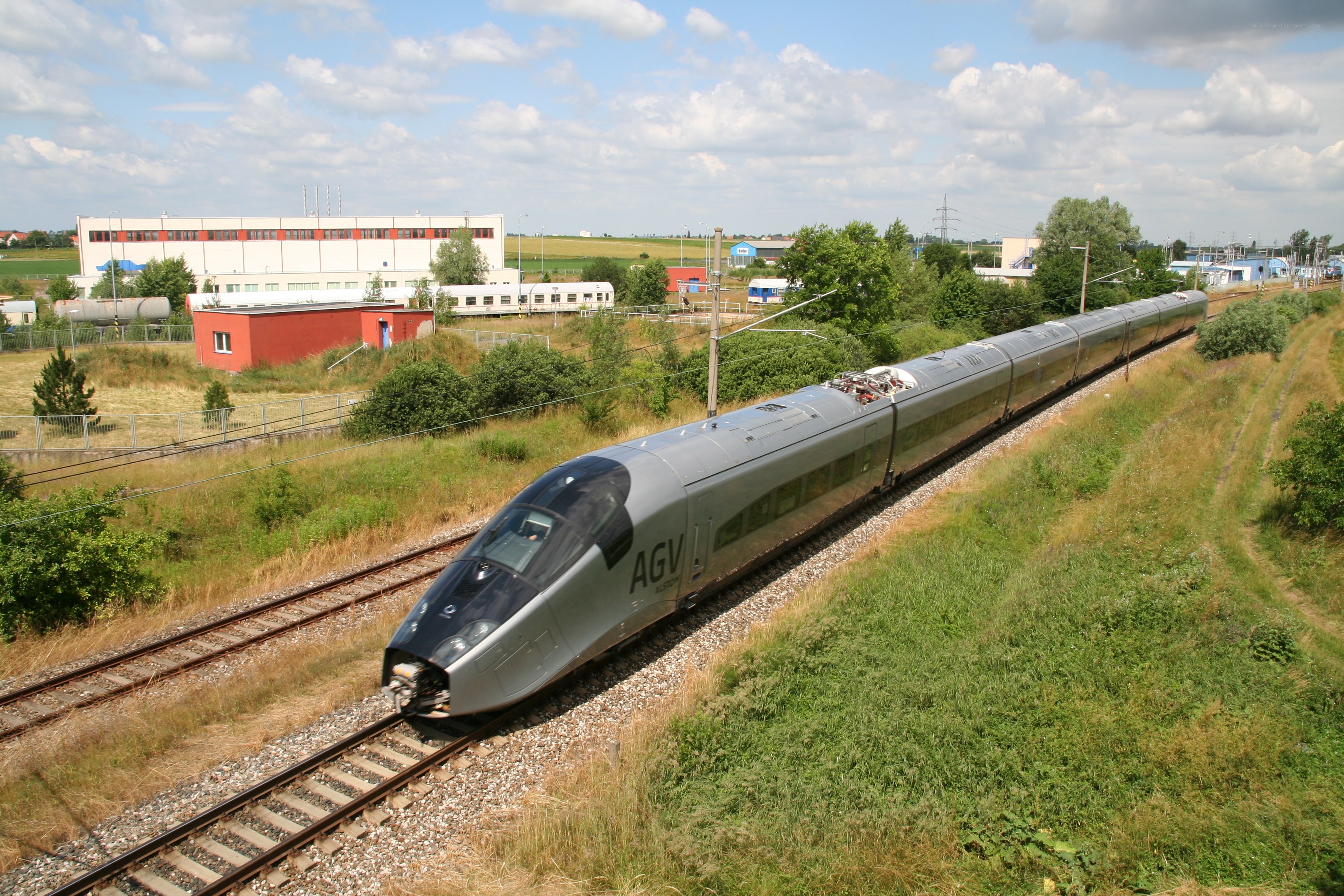 High-speed train on rural tracks