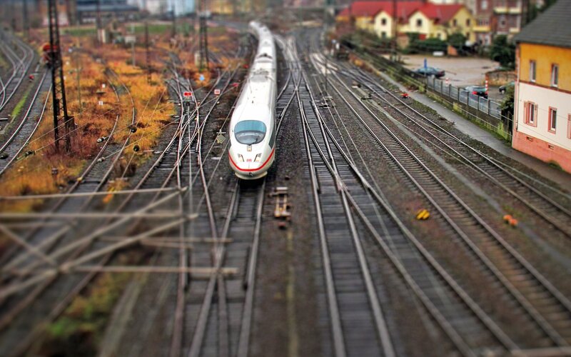 High-speed Train on Tracks — White, Calm
