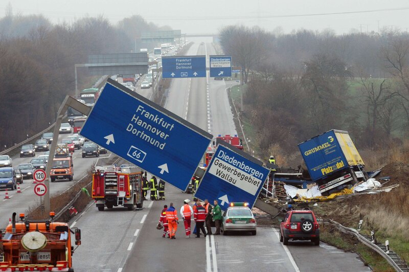 Highway accident with overturned truck