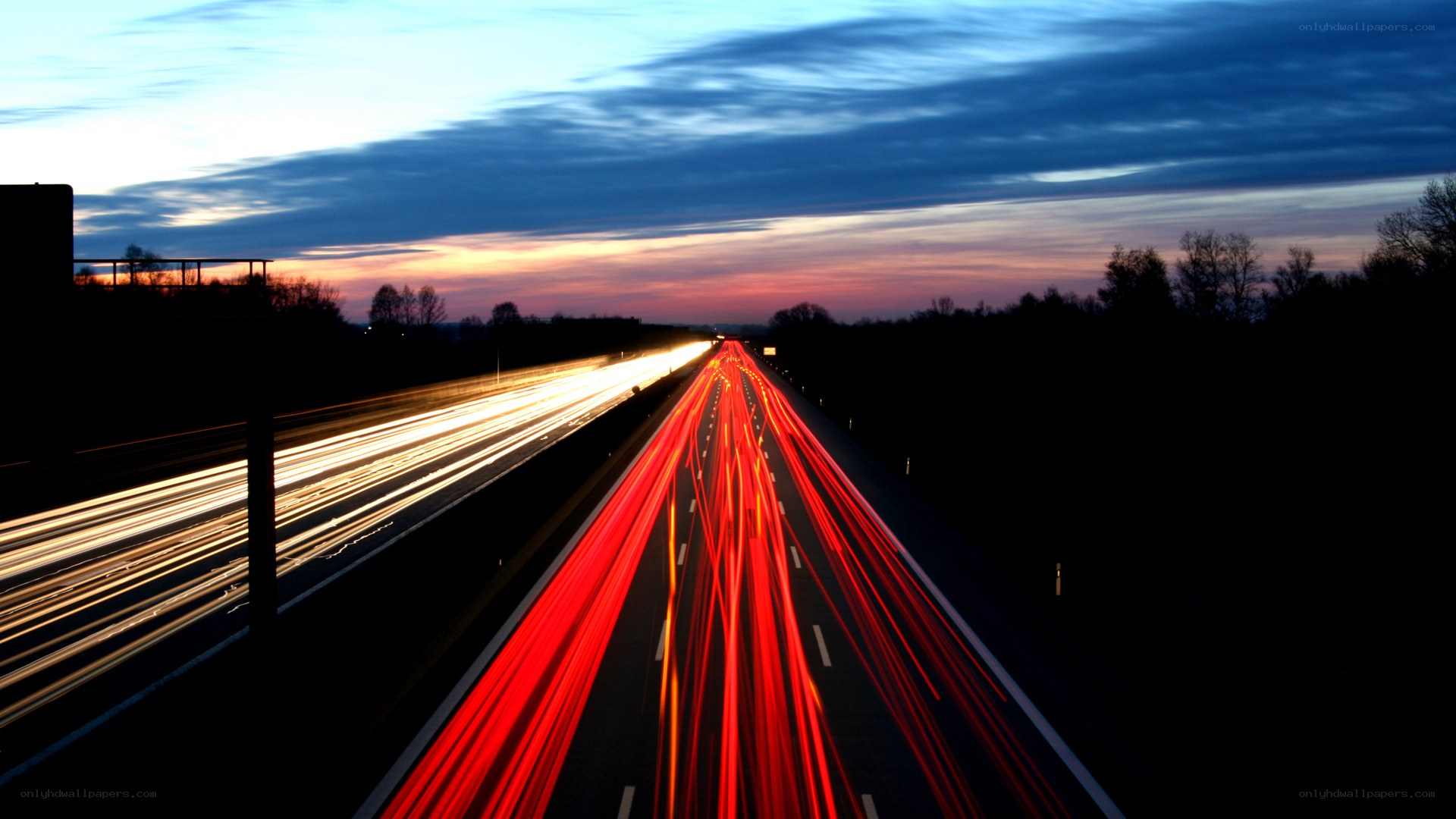 Highway at dusk with light trails
