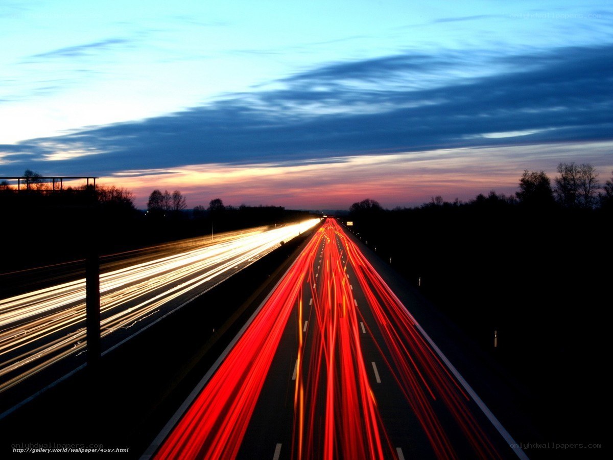 Highway at dusk with light trails