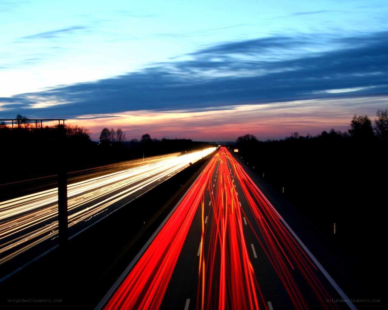 Highway at dusk with light trails