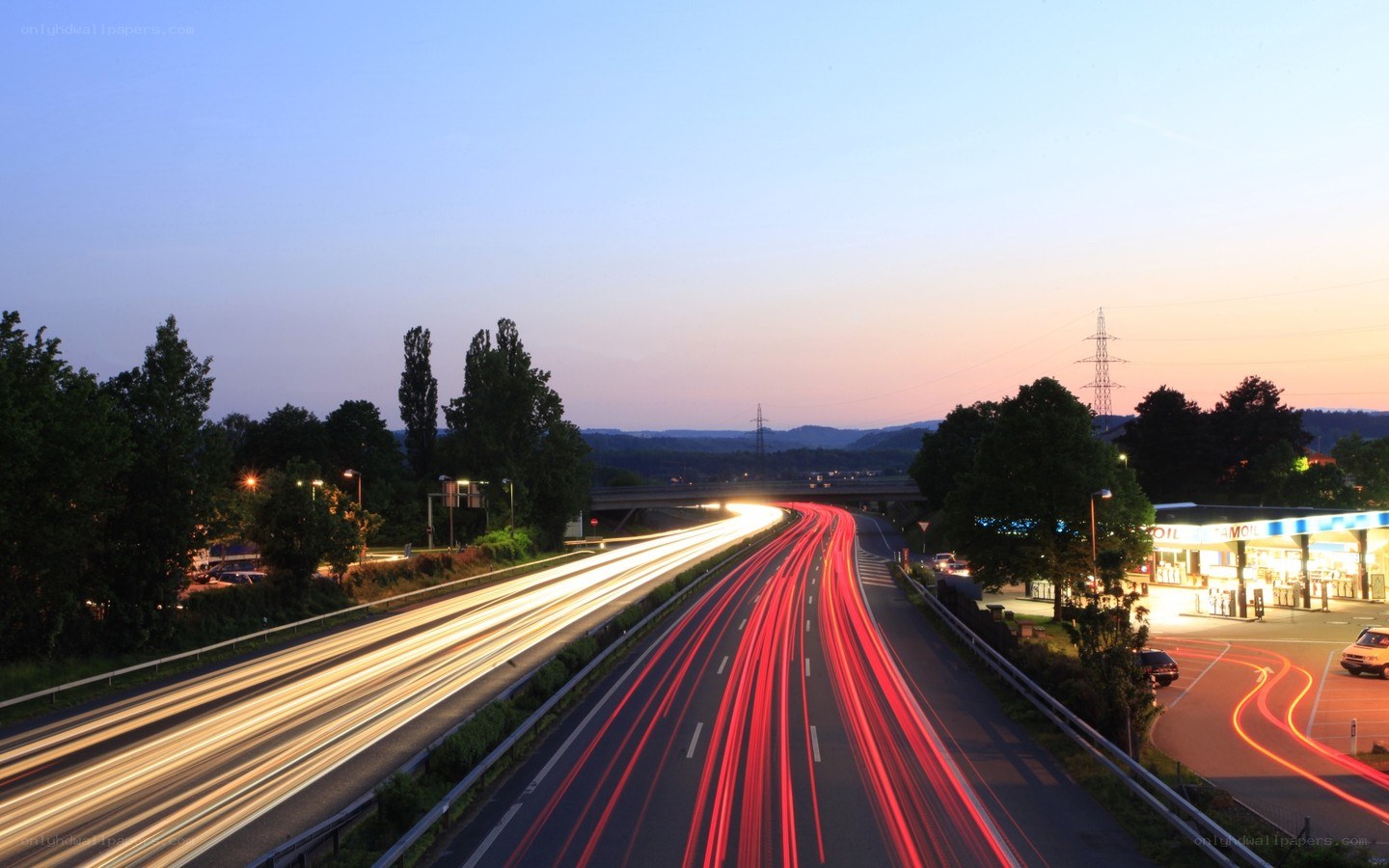 Highway at dusk with light trails