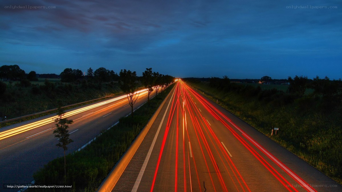 Highway at dusk with light trails
