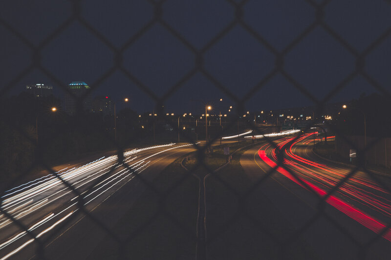 Highway at Night — Black, Dark, Photograph, Chain-link Fence, Light Trails