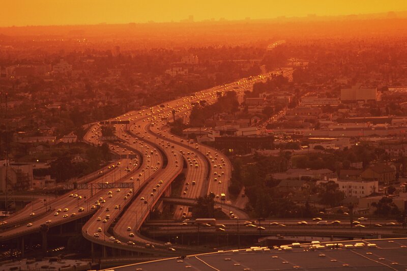 highway at sunset in urban area