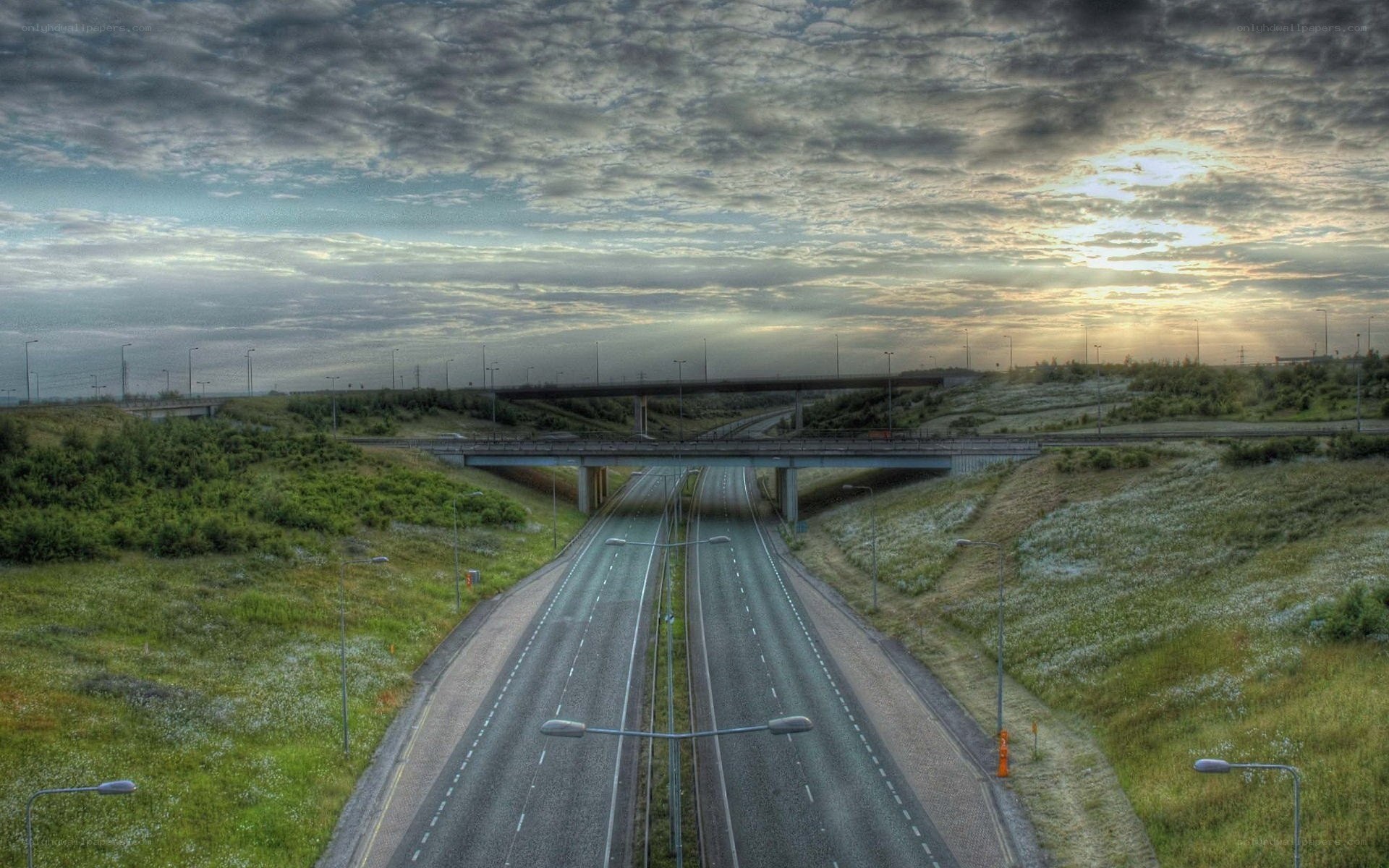 Highway at sunset with overpass