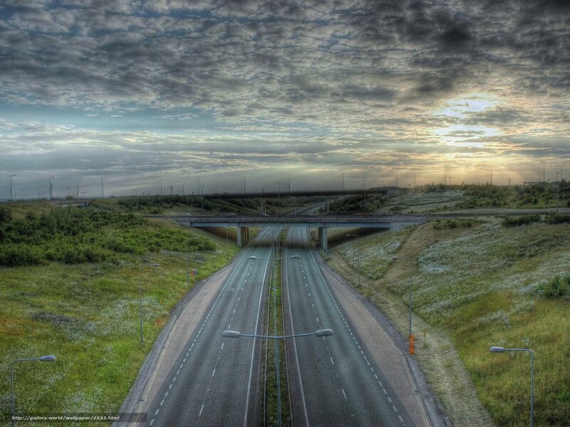 Highway at sunset with overpass