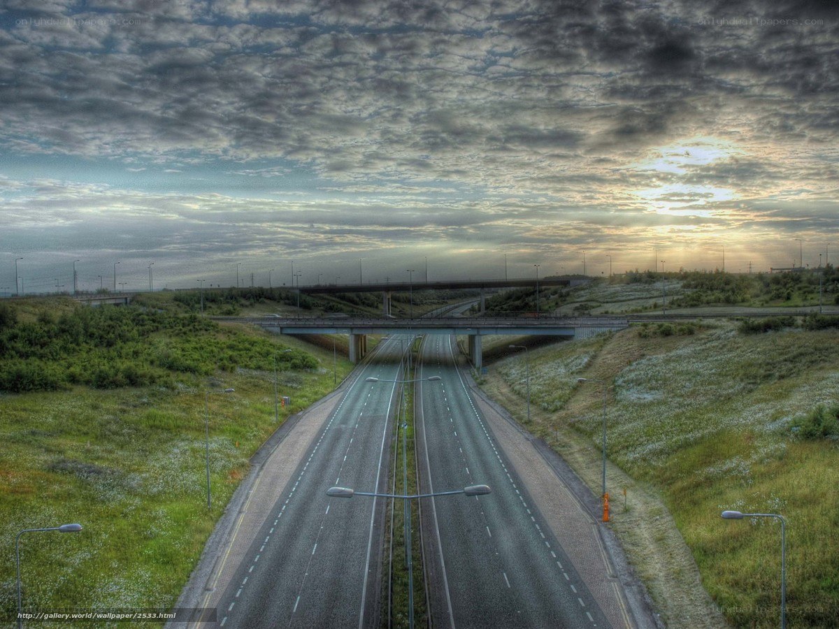 Highway at sunset with overpass