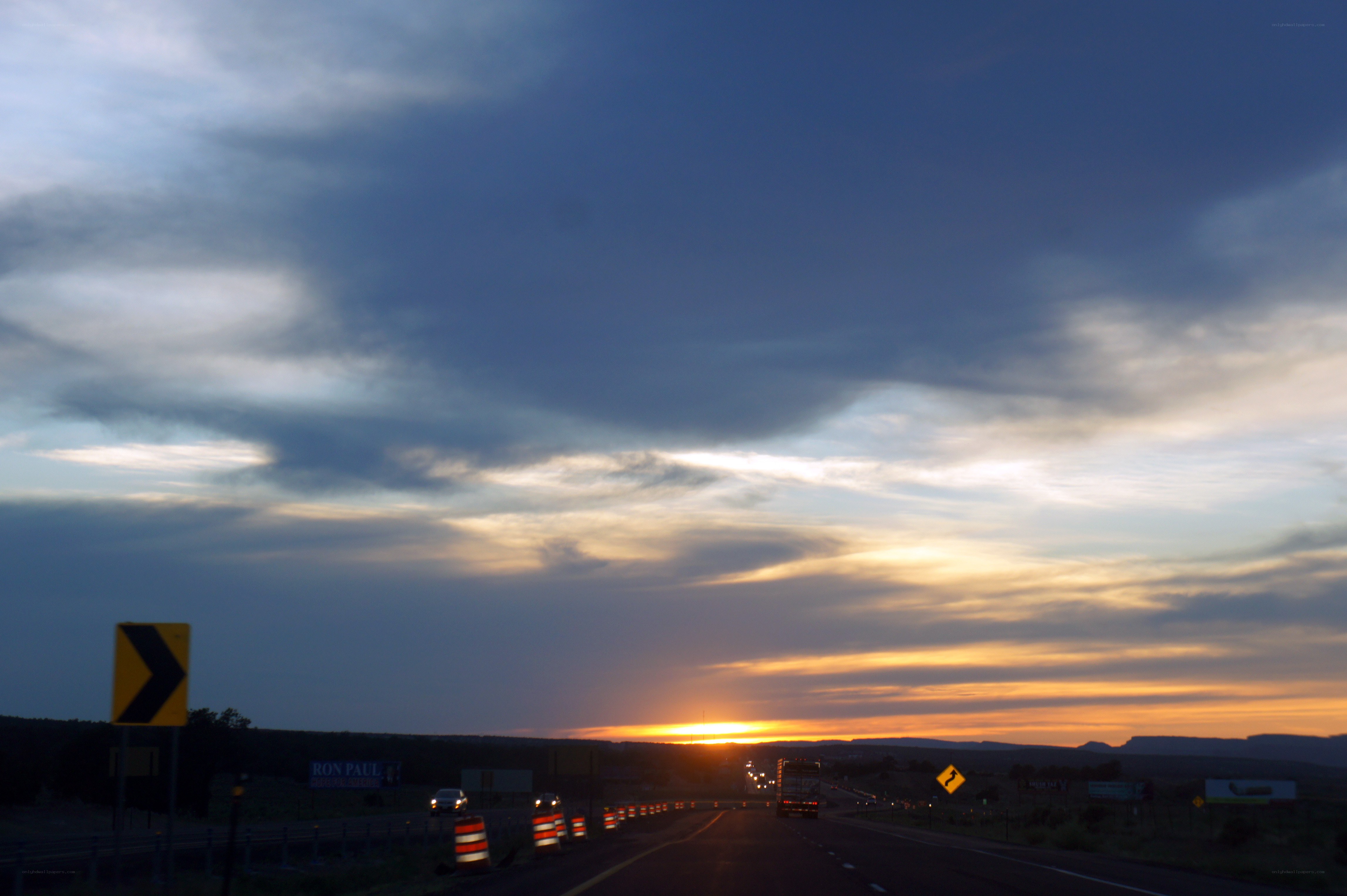 Highway at sunset with traffic