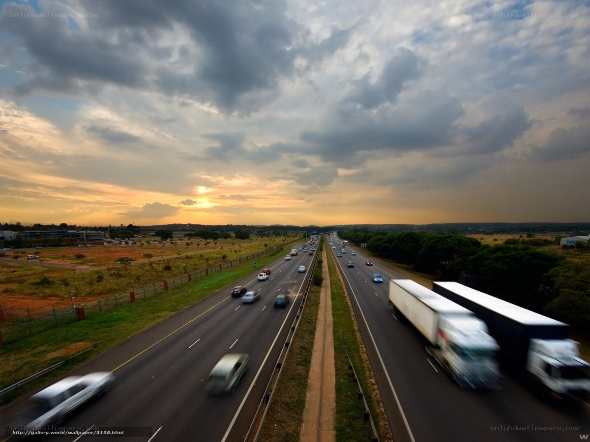 Highway at sunset with traffic