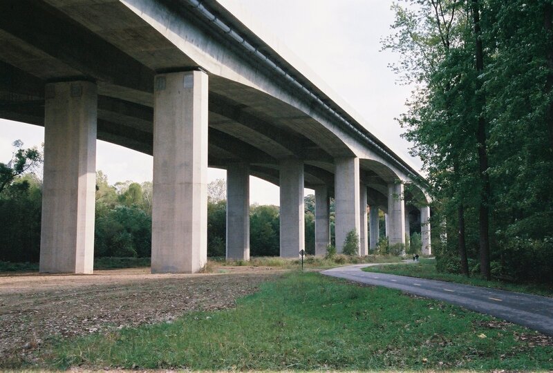 Highway bridge over park path
