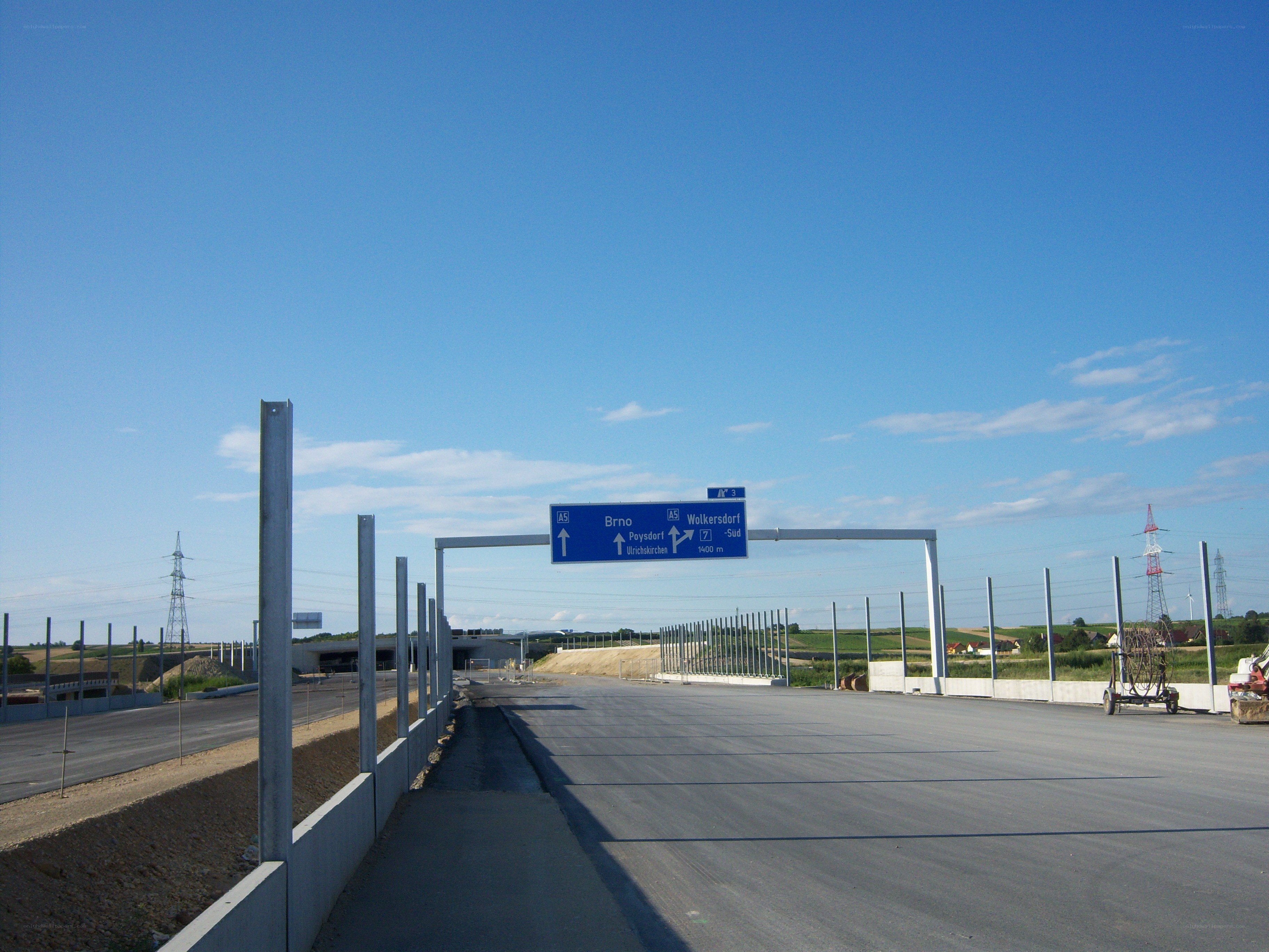 Highway construction site under blue sky