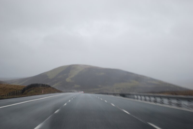 highway in foggy mountains