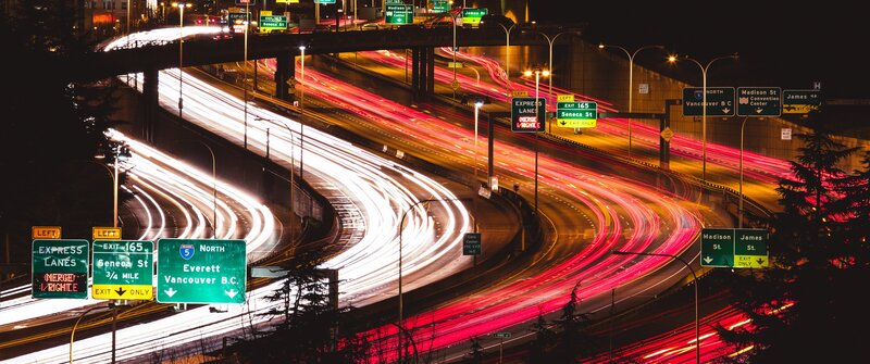 Highway Interchange at Night — Red
