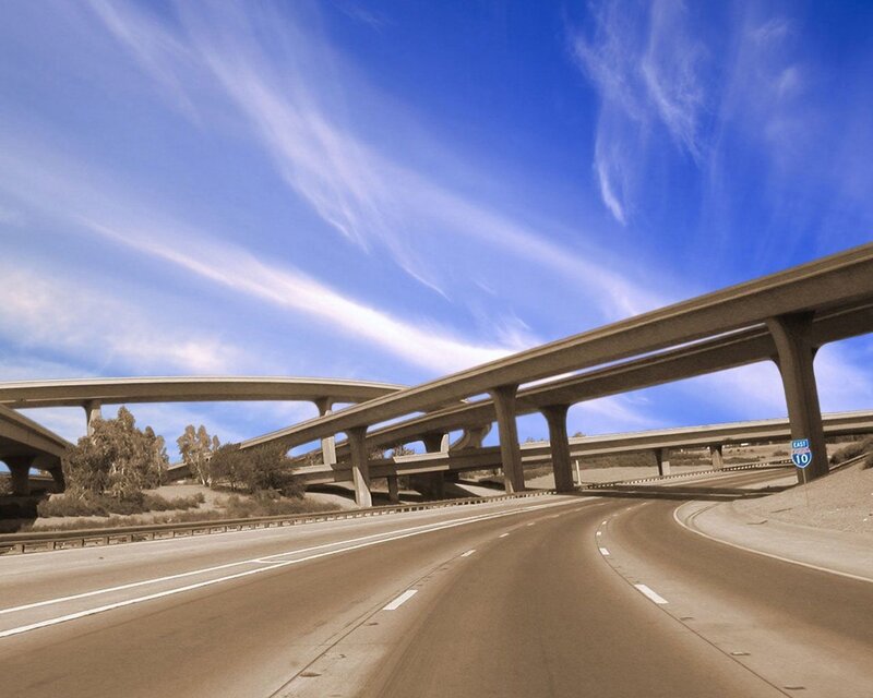Highway interchange under blue sky