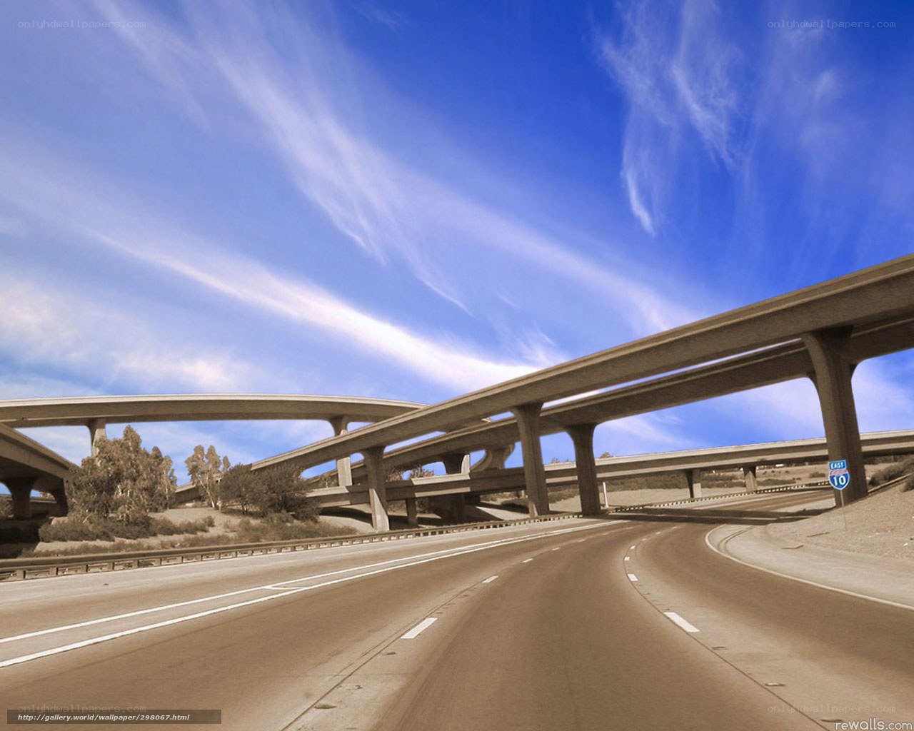 Highway interchange under blue sky