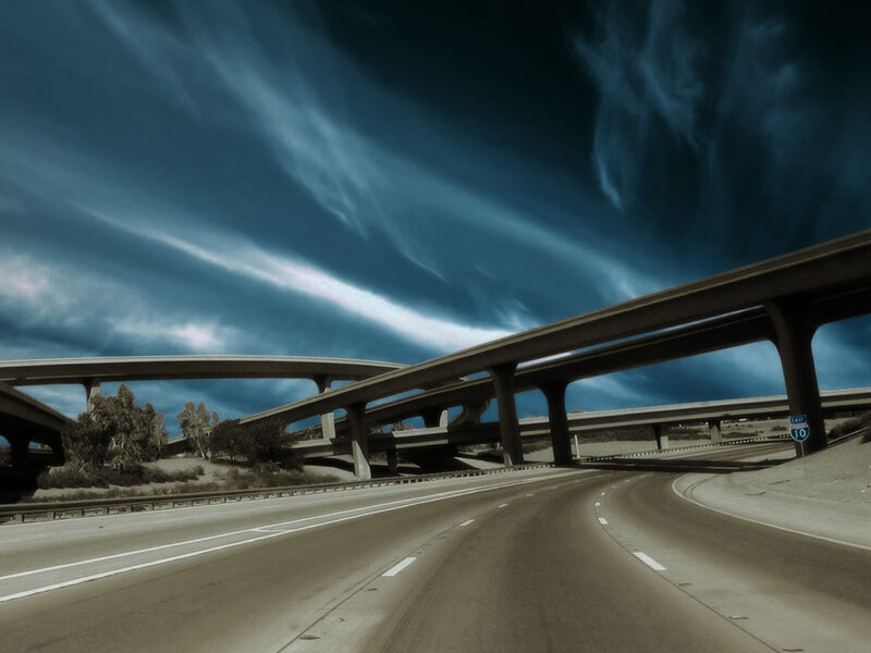 Highway Interchange under Stormy Sky