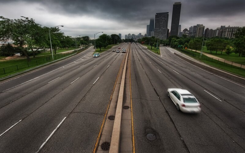 Highway leading to city skyline