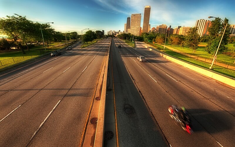 Highway leading to city skyline