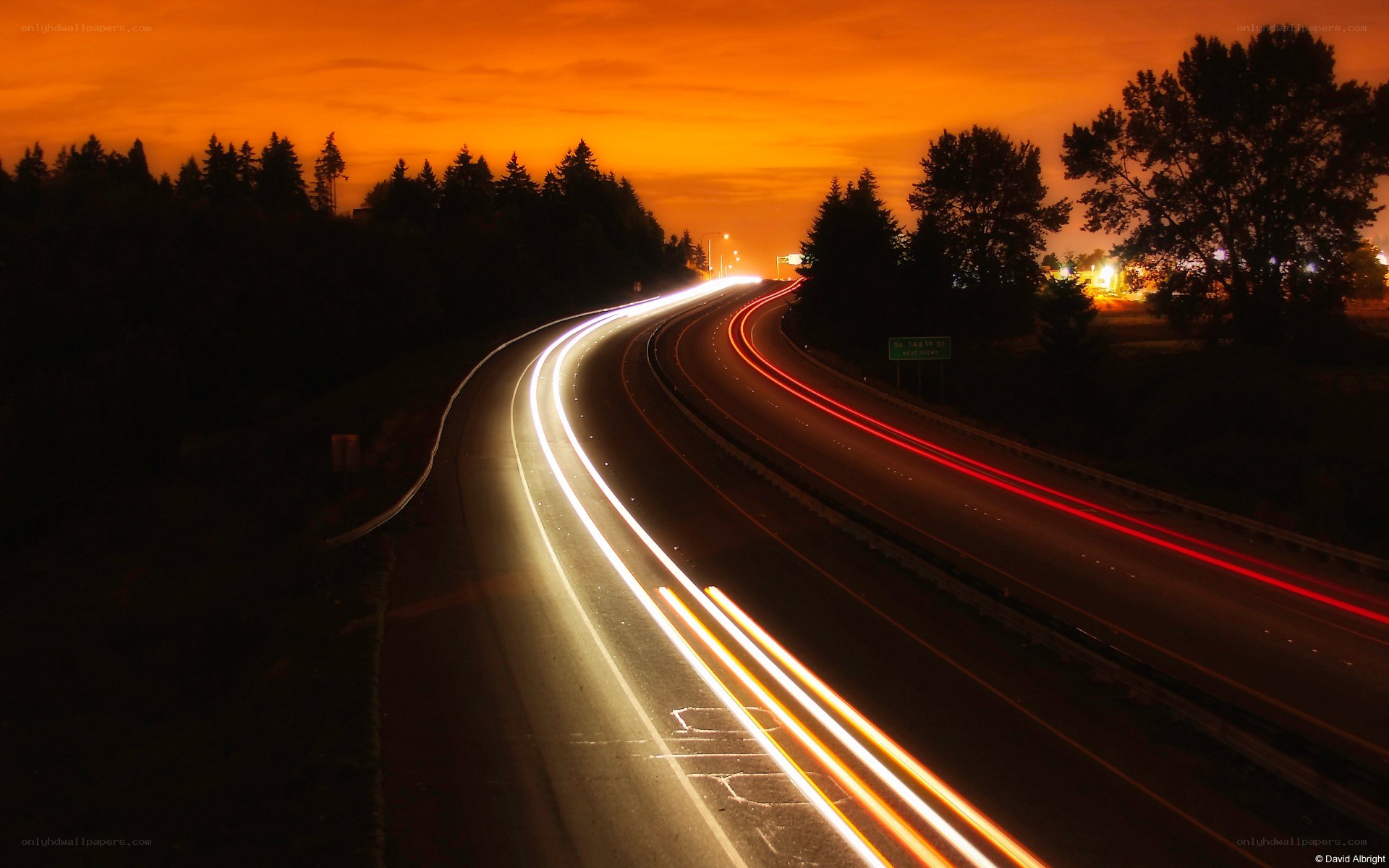 Highway light trails at dusk