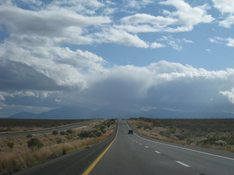 Highway Stretching to Mountains