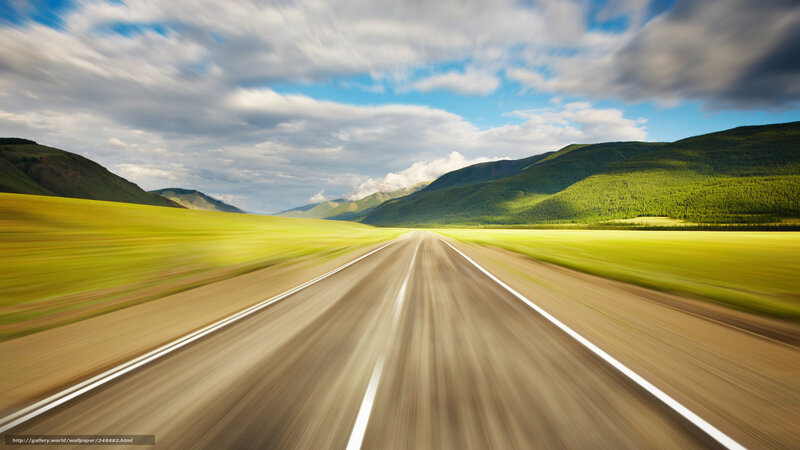 Highway through green valley